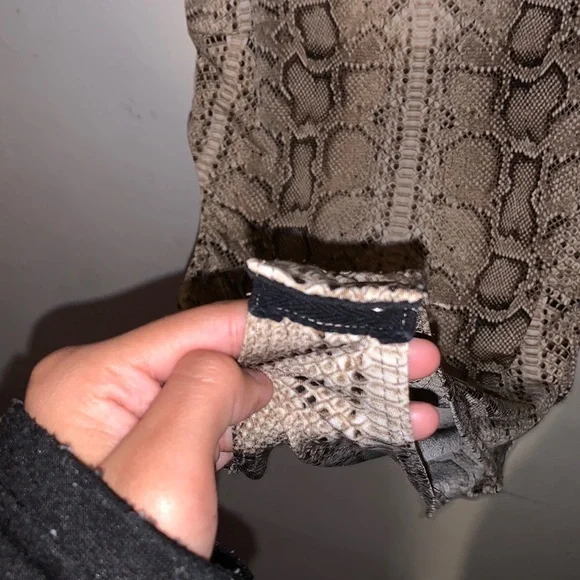 this is a body suit is from cage and it’s in good condition a medium - Picture 4 of 4